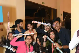 Students celebrating the world record with festival hashtags