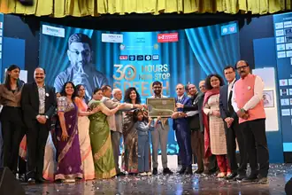 World record certificate presented to Saurabh Jain on stage